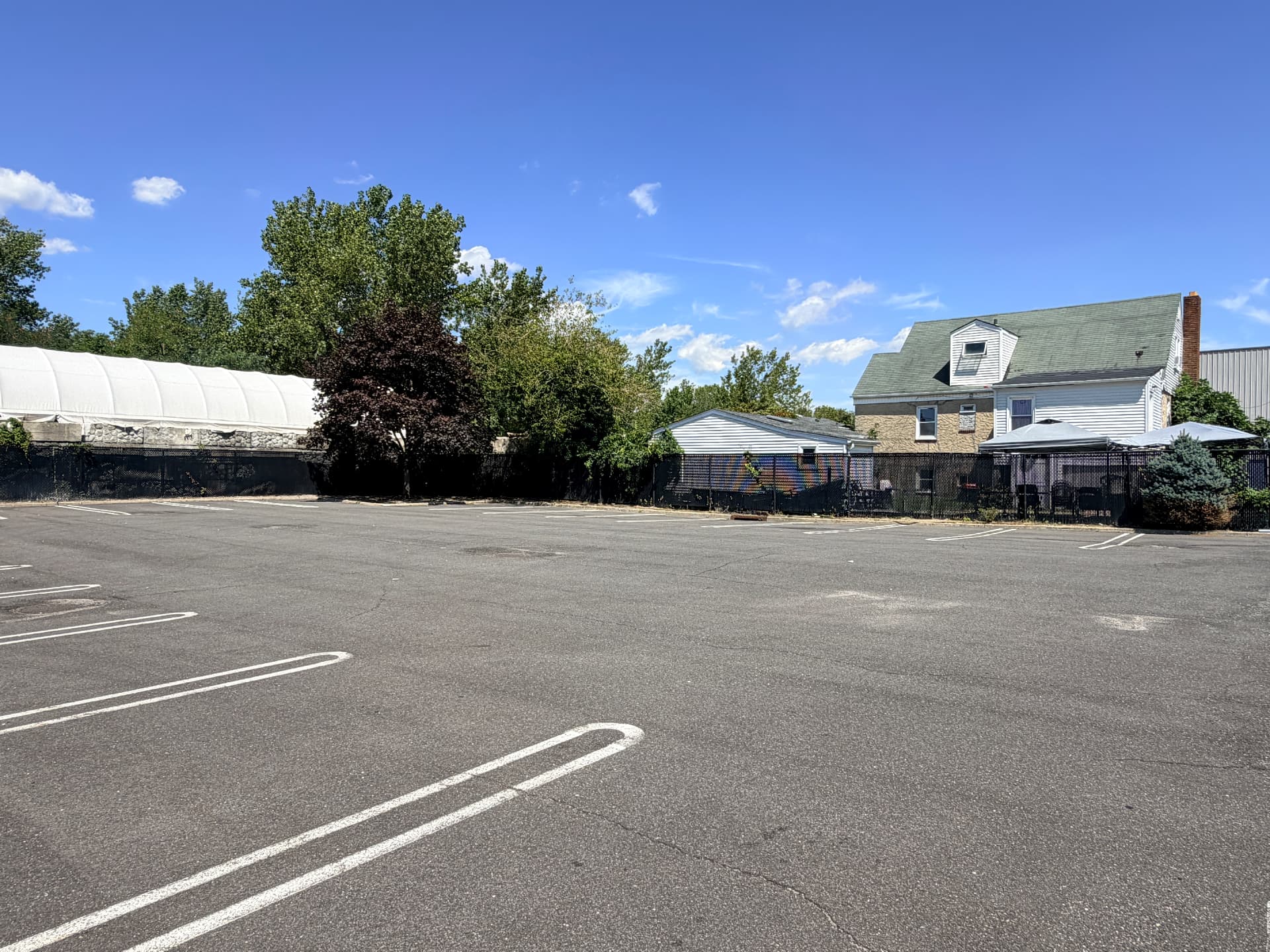 Rear lot — 50 striped spaces